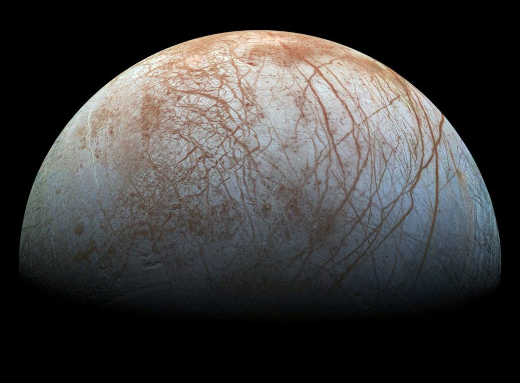 icy surface of jupiter moon europa from space