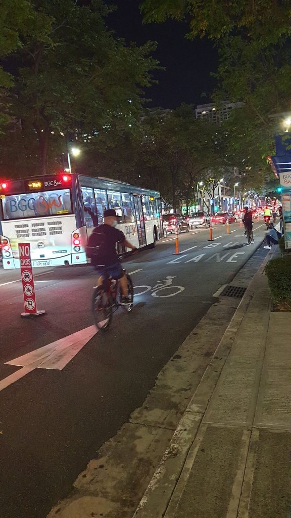 cyclists using a protected bike lane
